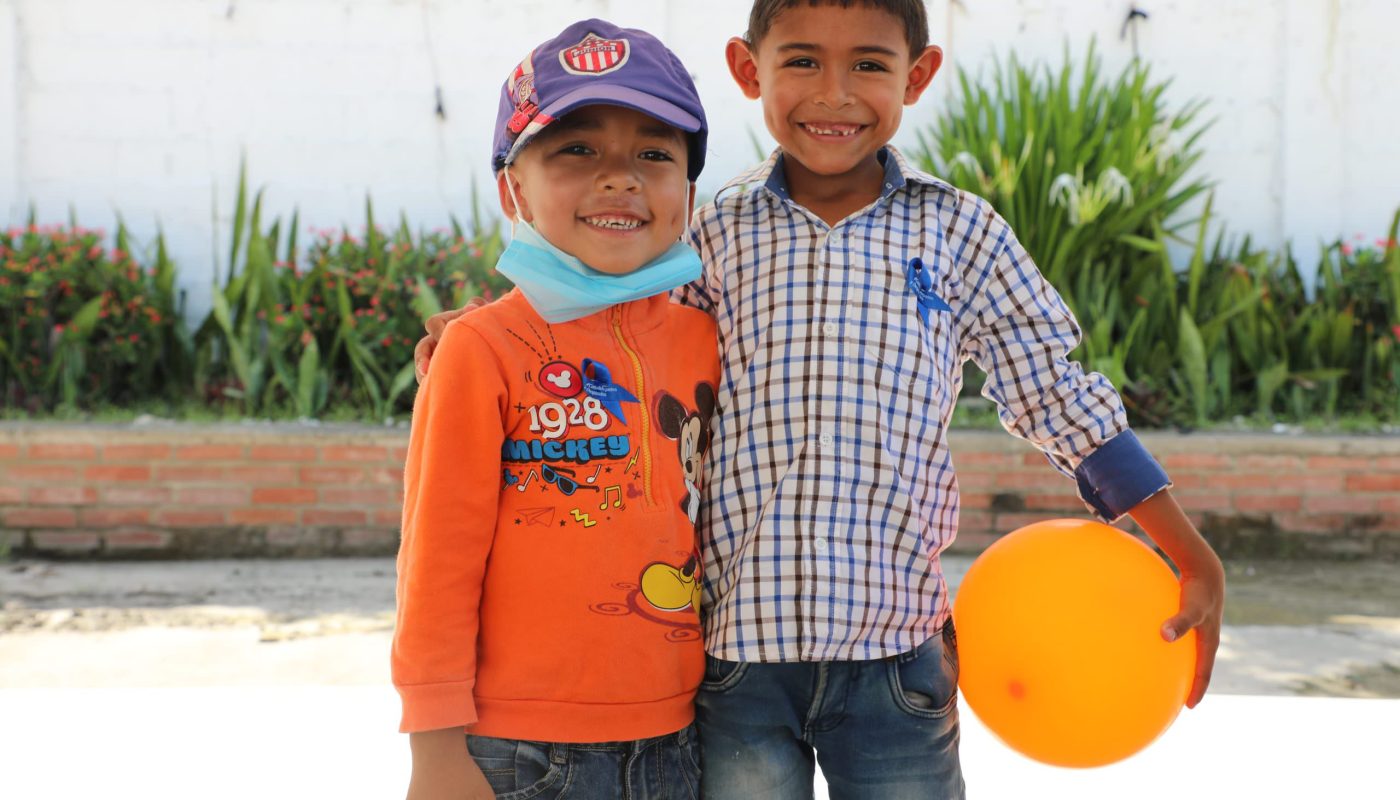 Two Venezuelan children participating in World Refugee Day commemoration in Barranquilla. The event included cultural activities and a presentation of recycled products created by refugees, migrants and local community members. All activities were led by UNHCR and Pastoral Social Barranquilla. ; On June 2022, UNHCR, partners and persons of concern commemorated World Refugee Day in Barranquilla. Activities carried out during this day included dance, rap, and a presentation of recycled products. The purpose of this event was to promote integration between refugees and migrants by showcasing their positive contribution to local host communities.